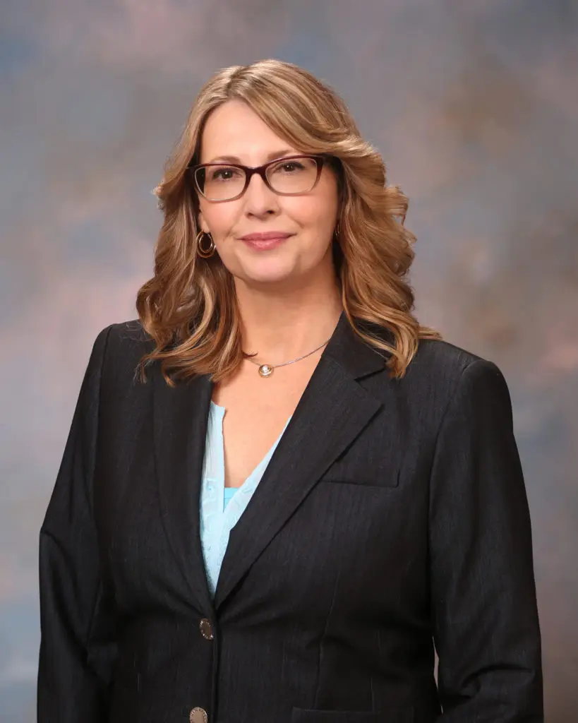 Headshot of Kay Wolff Kripchak founder, principal coach and consultant for Kay Wolff Coaching and Consulting wearing a black blazer.